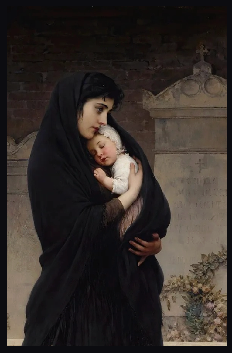 Woman in dark clothing holding a child in a cemetery
